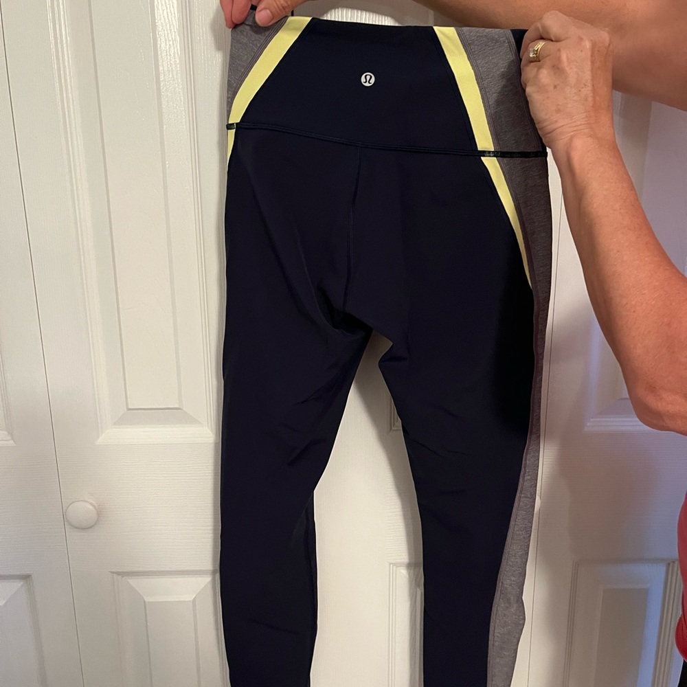 Lululemon Navy Leggings with Design Down Side of Leg